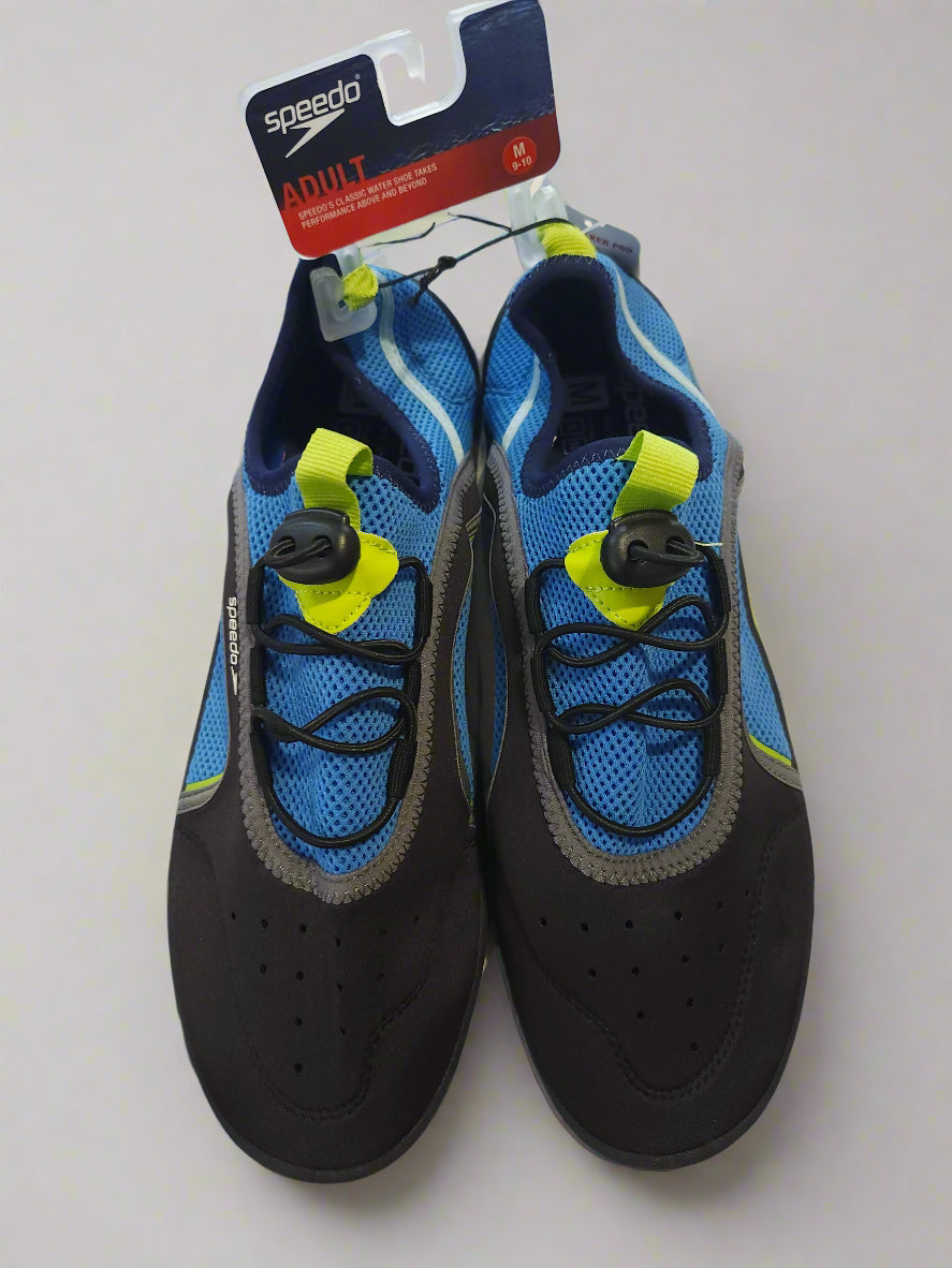 Pair of blue and black water shoes with yellow straps on a white background, featuring Speedo branding.